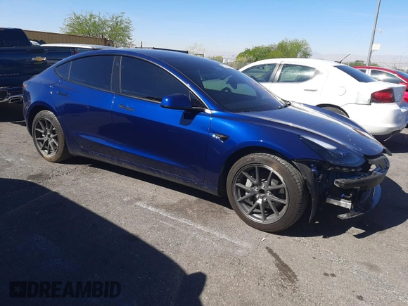 2023 Tesla Model 3 with VIN 5YJ3E1EA5PF652212, listed as a Copart auction lot 57348395 with 8,780 mi miles and Salvage title. Bid and sale history available at DreamBid. Image 4.