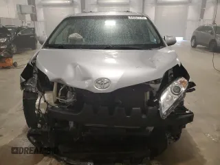 2017 Toyota Sienna XLE with VIN 5TDDZ3DC4HS166141, listed as a Copart auction lot 64357715 with 124,184 mi miles and Salvage title. Bid and sale history available at DreamBid. Image 5.