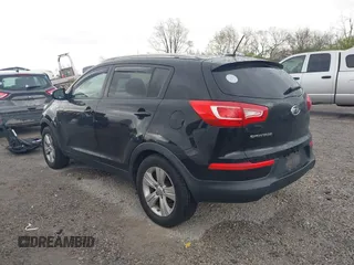 2012 Kia Sportage LX with VIN KNDPBCA27C7206731, listed as a IAAI auction lot 42056238 with 67,926 mi miles and . Bid and sale history available at DreamBid. Image 3.