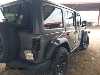 2020 Jeep Wrangler Unlimited Black and Tan с VIN 1C4HJXDG3LW266615, выставлен на аукционе IAAI как лот 42207899 с пробегом 55 291 миль миль и . История ставок и продаж доступна на DreamBid. Изображение 6.