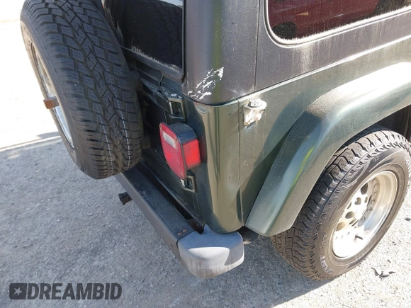 1997 Jeep Wrangler Sahara with VIN 1J4FY49S4VP523156, listed as a IAAI auction lot 42046797 with 193,408 mi miles. Bid and sale history available at carsss.com. Image 6.