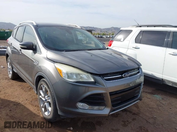 2014 Ford Escape Titanium with VIN 1FMCU0JX5EUC00297, listed as a IAAI auction lot 41928316 with 146,406 mi miles. Bid and sale history available at carsss.com. Image 1.
