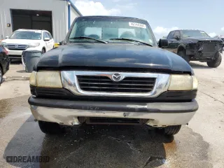 1999 Mazda B-Series 2WD Truck SX with VIN 4F4YR12C1XTM24843, listed as a Copart auction lot 46144364 with 346,188 mi miles and Salvage Title. Bid and sale history available at carsss.com. Image 5.