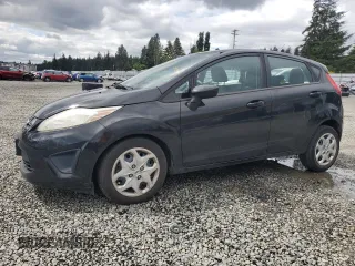 2013 Ford Fiesta S z VIN 3FADP4TJ5DM219571, wystawiony jako Copart lot #57910515 z przebiegiem 79 377 mil mil oraz Szkoda całkowita • Salvage title. Historia ofert i sprzedaży dostępna na DreamBid. Obrazek 1.