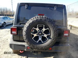 2021 Jeep Wrangler Unlimited Rubicon with VIN 1C4HJXFGXMW580776, listed as a Copart auction lot 46478105 with 56,120 mi miles and Salvage Title. Bid and sale history available at DreamBid. Image 6.