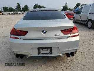 2017 BMW M6 z VIN WBS6E9C56HG437374, wystawiony jako Copart lot #54277624 z przebiegiem 80 858 mil mil oraz . Historia ofert i sprzedaży dostępna na DreamBid. Obrazek 6.