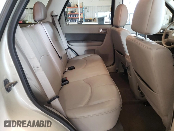 2011 Mercury Mariner Premier z VIN 4M2CN9HG9BKJ06775, wystawiony jako Copart lot #59256315 z przebiegiem 186 694 mil mil oraz Szkoda całkowita • Salvage title. Historia ofert i sprzedaży dostępna na DreamBid. Obrazek 11.