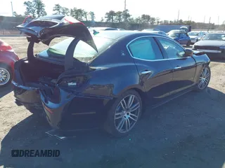 2014 Maserati Ghibli S Q4 z VIN ZAM57RTA9E1089297, wystawiony jako IAAI lot #41687559 z przebiegiem 64 627 mil mil oraz . Historia ofert i sprzedaży dostępna na DreamBid. Obrazek 4.