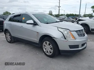2011 Cadillac SRX Luxury Collection z VIN 3GYFNAEY8BS557373, wystawiony jako IAAI lot #41848190 z przebiegiem Nie podano mil oraz . Historia ofert i sprzedaży dostępna na DreamBid. Obrazek 1.