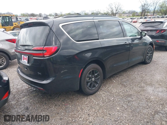 2022 Chrysler Pacifica Touring L with VIN 2C4RC1BG9NR194782, listed as a IAAI auction lot 41842410 with 76,231 mi miles and . Bid and sale history available at DreamBid. Image 4.
