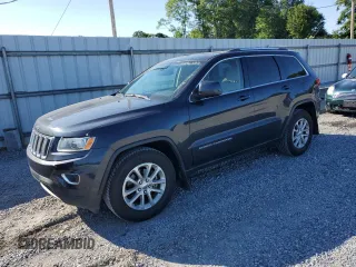 2014 Jeep Grand Cherokee Laredo with VIN 1C4RJEAG9EC260562, listed as a Copart auction lot 56496384 with 113,898 mi miles and Salvage Title. Bid and sale history available at carsss.com. Image 1.