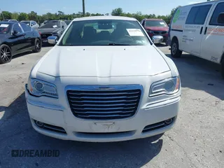2014 Chrysler 300 with VIN 2C3CCAET6EH173381, listed as a IAAI auction lot 42158270 with 124,551 mi miles. Bid and sale history available at carsss.com. Image 12.