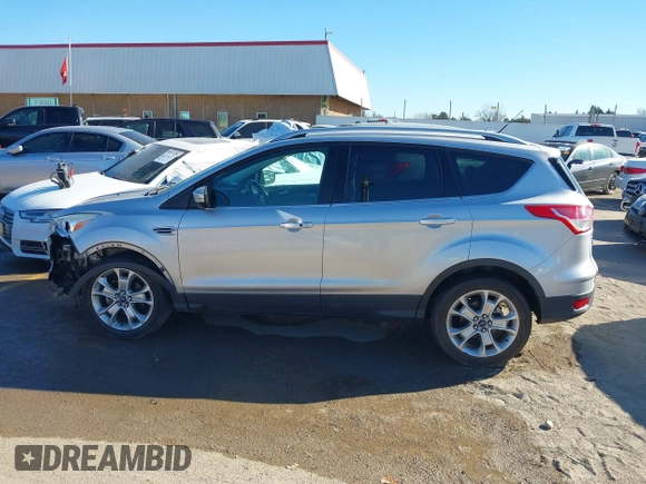 2014 Ford Escape Titanium with VIN 1FMCU0JX7EUC59643, listed as a IAAI auction lot 41082952 with 143,899 mi miles. Bid and sale history available at carsss.com. Image 15.