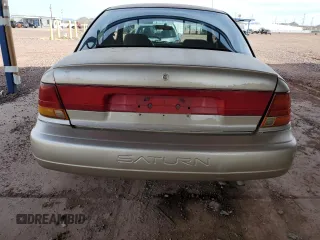 1998 Saturn SL z VIN 1G8ZK5276WZ213784, wystawiony jako Copart lot #49206105 z przebiegiem 160 280 mil mil oraz Szkody całkowita. Historia ofert i sprzedaży dostępna na DreamBid. Obrazek 6.