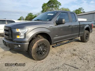 2015 Ford F-150 XLT with VIN 1FTEX1EP6FFC63287, listed as a Copart auction lot 54207595 with 128,334 mi miles and Salvage title. Bid and sale history available at DreamBid. Image 1.