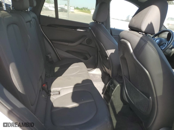 2019 BMW X1 xDrive28i with VIN WBXHT3C53K5L35670, listed as a Copart auction lot 53493245 with 14,201 mi miles and Salvage Title. Bid and sale history available at carsss.com. Image 10.