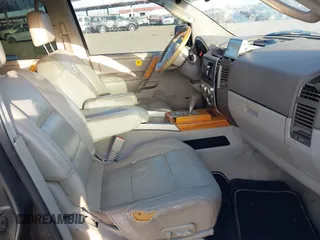 2004 Infiniti QX56 with VIN 5N3AA08C34N803588, listed as a IAAI auction lot 41546043 with 190,599 mi miles. Bid and sale history available at carsss.com. Image 5.