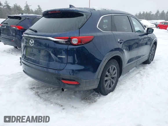 2021 Mazda CX-9 Touring with VIN JM3TCBCY8M0509073, listed as a IAAI auction lot 41563640 with 38,779 mi miles. Bid and sale history available at carsss.com. Image 4.