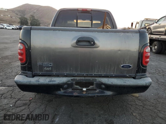 2002 Ford F-150 Harley Davidson with VIN 1FTRW07332KE10689, listed as a Copart auction lot 88341885 with 0 mi miles and Salvage Title. Bid and sale history available at carsss.com. Image 6.