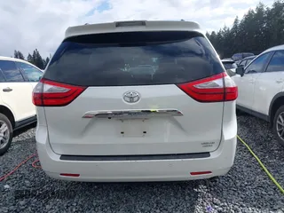 2018 Toyota Sienna XLE with VIN 5TDDZ3DC6JS199051, listed as a IAAI auction lot 41945587 with 58,818 mi miles and . Bid and sale history available at DreamBid. Image 16.
