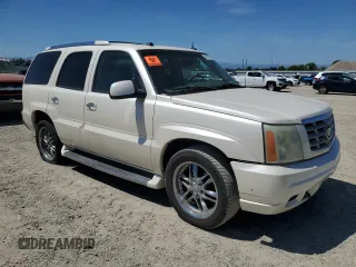 2004 Cadillac Escalade with VIN 1GYEC63T94R142929, listed as a Copart auction lot 58657835 with 147,193 mi miles and Clean title. Bid and sale history available at DreamBid. Image 4.