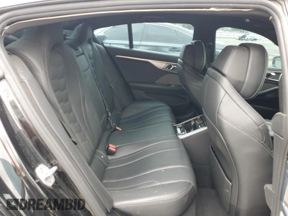 2022 BMW 8 Series M850i z VIN WBAGV8C02NCK08667, wystawiony jako Copart lot #55632805 z przebiegiem 22 737 mil mil oraz Szkody całkowita. Historia ofert i sprzedaży dostępna na DreamBid. Obrazek 10.