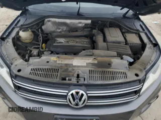 2015 Volkswagen Tiguan R-Line z VIN WVGAV7AX7FW515931, wystawiony jako Copart lot #52606635 z przebiegiem 127 391 mil mil oraz Czysty tytuł • Clean title. Historia ofert i sprzedaży dostępna na DreamBid. Obrazek 12.