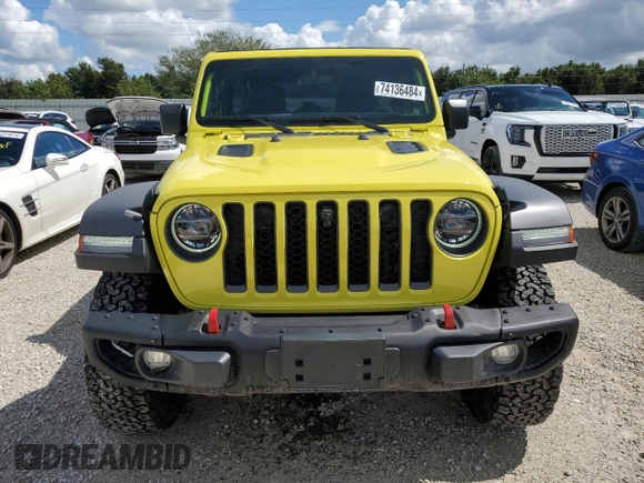 2022 Jeep Wrangler Unlimited Rubicon with VIN 1C4HJXFG3NW214174, listed as a Copart auction lot 74136484 with 5,292 mi miles and Salvage title. Bid and sale history available at DreamBid. Image 5.