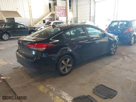 2018 Kia Forte LX with VIN 3KPFL4A71JE261201, listed as a IAAI auction lot 41658320 with 146,872 mi miles. Bid and sale history available at carsss.com. Image 4.