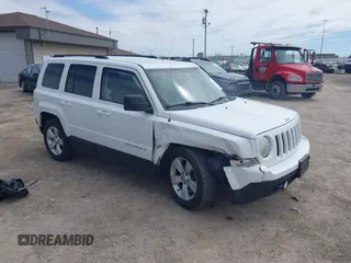 2014 Jeep Patriot Sport with VIN 1C4NJRBB5ED778512, listed as a IAAI auction lot 42172300 with 118,934 mi miles. Bid and sale history available at carsss.com. Image 1.