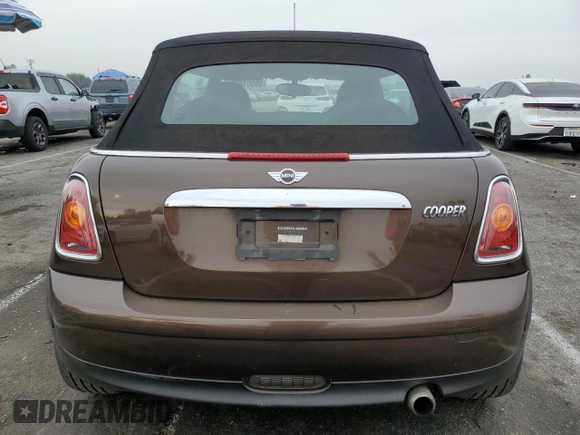 2009 MINI Convertible с VIN WMWMR335X9TU96627, выставлен на аукционе Copart как лот 86551094 с пробегом 91 843 миль миль и Чистый • Clean title. История ставок и продаж доступна на DreamBid. Изображение 6.