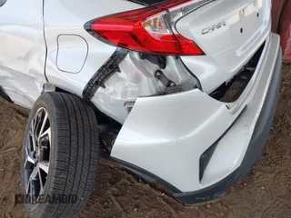 2022 Toyota C-HR XLE with VIN NMTKHMBX5NR147226, listed as a IAAI auction lot 42068867 with 21,863 mi miles. Bid and sale history available at carsss.com. Image 6.
