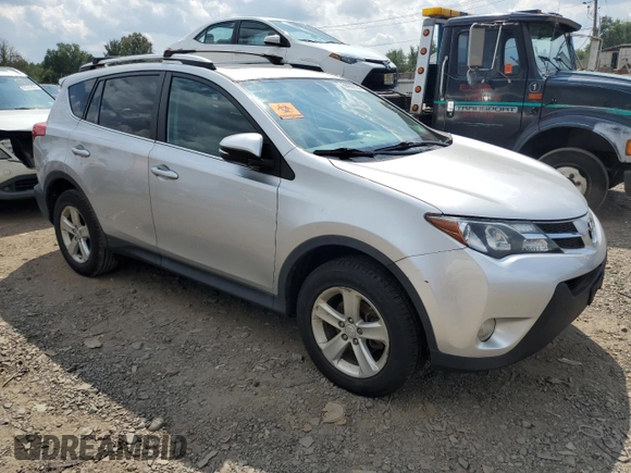 2014 Toyota RAV4 XLE with VIN 2T3RFREV3EW157703, listed as a Copart auction lot 68909594 with 69,305 mi miles and Salvage Title. Bid and sale history available at carsss.com. Image 4.