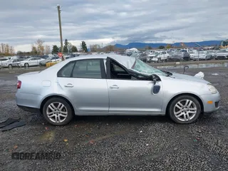 2008 Volkswagen Jetta S z VIN 3VWJM71K18M026226, wystawiony jako IAAI lot #40944671 z przebiegiem 90 016 mil mil oraz . Historia ofert i sprzedaży dostępna na DreamBid. Obrazek 13.