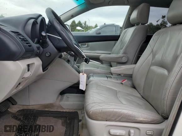 2006 Lexus RX 400h with VIN JTJHW31U760017663, listed as a Copart auction lot 58239885 with 195,120 mi miles and Salvage title. Bid and sale history available at DreamBid. Image 7.
