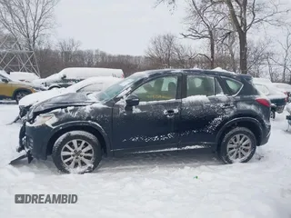 2016 Mazda CX-5 Sport z VIN JM3KE4BY0G0919017, wystawiony jako IAAI lot #41316161 z przebiegiem 209 259 mil mil oraz . Historia ofert i sprzedaży dostępna na DreamBid. Obrazek 14.