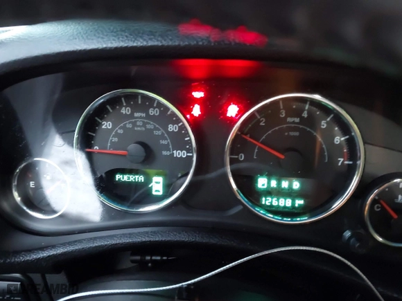 2015 Jeep Wrangler Unlimited Rubicon Hard Rock with VIN 1C4HJWFG1FL659803, listed as a IAAI auction lot 41172485 with 126,881 mi miles. Bid and sale history available at carsss.com. Image 7.