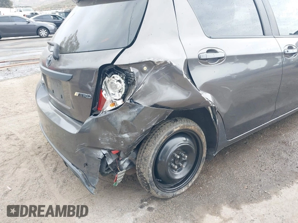 2013 Toyota Yaris L with VIN JTDKTUD34DD547878, listed as a IAAI auction lot 42108444 with 241,269 mi miles. Bid and sale history available at carsss.com. Image 6.