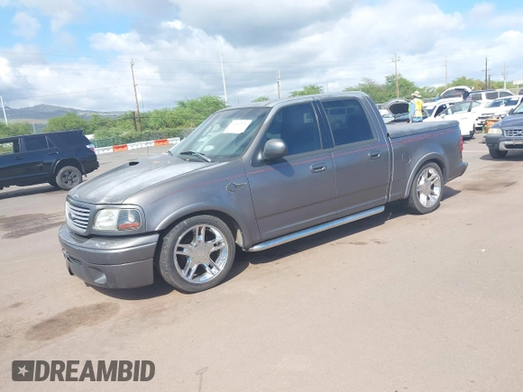2002 Ford F-150 Harley Davidson with VIN 1FTRW07312KC88379, listed as a IAAI auction lot 41657219 with 1 mi miles. Bid and sale history available at carsss.com. Image 17.