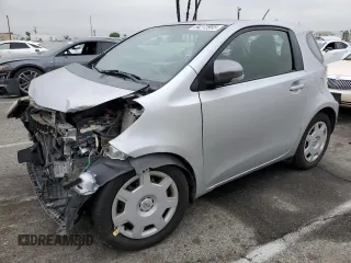 2012 Scion iQ z VIN JTNJJXB04CJ017482, wystawiony jako Copart lot #54272985 z przebiegiem 93 635 mil mil oraz Szkody całkowita. Historia ofert i sprzedaży dostępna na DreamBid. Obrazek 1.