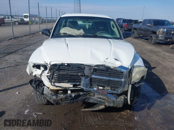 2005 Dodge Dakota SLT with VIN 1D7HW48N85S226460, listed as a IAAI auction lot 41568128 with 213,159 mi miles and . Bid and sale history available at carsss.com. Image 6.