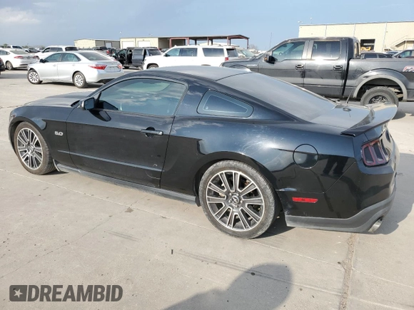 2012 Ford Mustang GT Premium with VIN 1ZVBP8CF0C5251771, listed as a Copart auction lot 50801515 with 104,833 mi miles and Salvage Title. Bid and sale history available at DreamBid. Image 2.