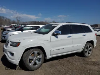 2014 Jeep Grand Cherokee Overland with VIN 1C4RJFCT7EC105296, listed as a Copart auction lot 50822775 with 180,067 mi miles and Salvage Title. Bid and sale history available at DreamBid. Image 1.