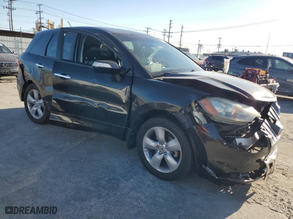 2009 Acura RDX Tech Pkg with VIN 5J8TB18589A002648, listed as a Copart auction lot 46259315 with 117,553 mi miles and Salvage Title. Bid and sale history available at carsss.com. Image 4.