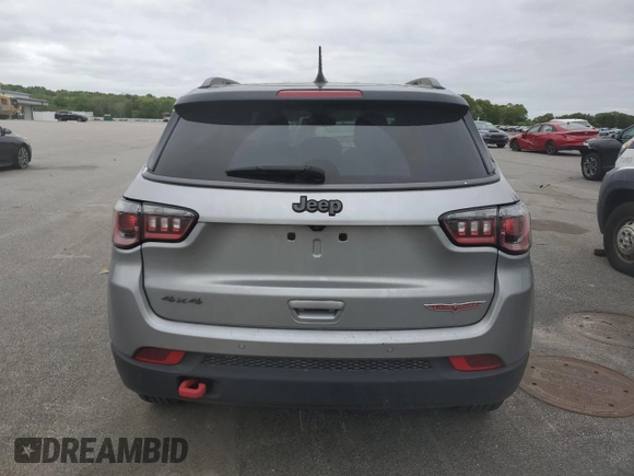 2021 Jeep Compass Trailhawk z VIN 3C4NJDDBXMT565063, wystawiony jako Copart lot #57620595 z przebiegiem 125 956 mil mil oraz Czysty tytuł • Clean title. Historia ofert i sprzedaży dostępna na DreamBid. Obrazek 6.