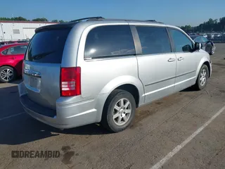 2010 Chrysler Town & Country Touring with VIN 2A4RR5D19AR202169, listed as a IAAI auction lot 42123581 with 183,000 mi miles and . Bid and sale history available at DreamBid. Image 4.