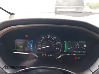 2016 Lincoln MKZ Hybrid with VIN 3LN6L2LU6GR605724, listed as a IAAI auction lot 41989432 with 154,035 mi miles. Bid and sale history available at carsss.com. Image 7.
