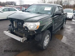 2013 Toyota Tacoma with VIN 3TMLU4EN3DM123470, listed as a IAAI auction lot 41952721 with 72,296 mi miles and . Bid and sale history available at DreamBid. Image 6.