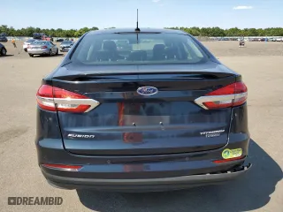 2020 Ford Fusion Plug-In Hybrid Titanium with VIN 3FA6P0SUXLR101997, listed as a Copart auction lot 69575324 with 74,121 mi miles and Salvage Title. Bid and sale history available at carsss.com. Image 6.