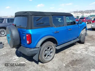 2023 Ford Bronco z VIN 1FMEE5BP1PLA88463, wystawiony jako IAAI lot #41871905 z przebiegiem 36 223 mil mil oraz . Historia ofert i sprzedaży dostępna na DreamBid. Obrazek 4.